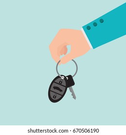 Businessman hand holding car key isolated on blue background, flat design vector illustration.