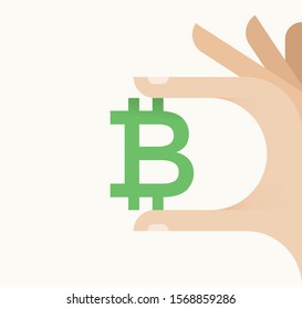Businessman hand holding electronic crypto currency bitcoin symbol