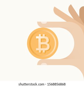 Businessman hand holding golden money coin with electronic crypto currency bitcoin symbol