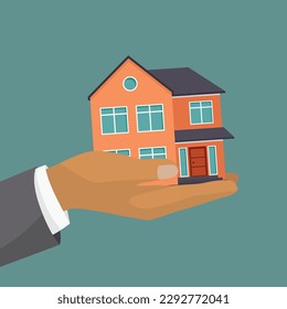 Businessman hand holding house represent buying a house concept, property purchase, real estate offer, rental 
