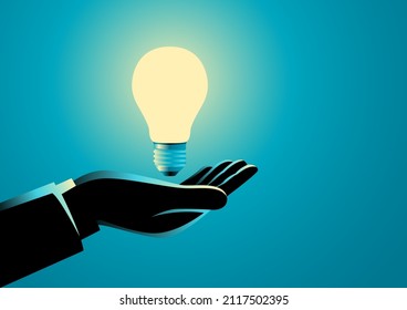 Businessman hand holding a light bulb, innovation, idea and inspiration concept