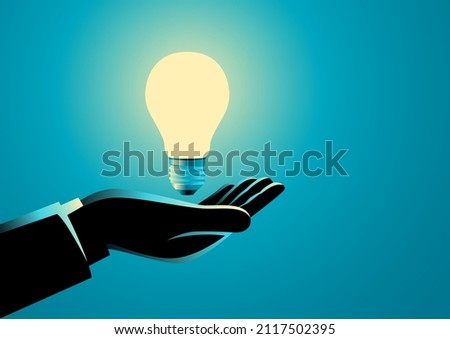 Businessman hand holding a light bulb, innovation, idea and inspiration concept Foto d'archivio © 