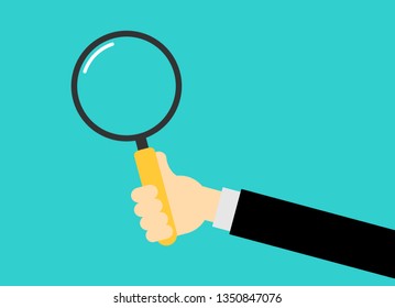 magnifying glass with hand vector