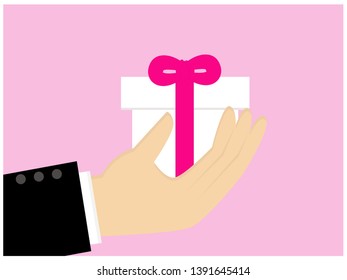 businessman hand holding a small  box gift