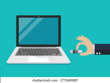 Businessman hand holding usb flash drive to connect a computer laptop. Vector illustration