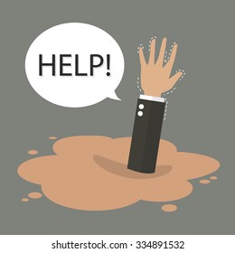 Businessman hand sinking in a puddle of quicksand. Business concept