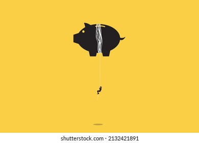 Businessman hanging on a large piggy bank balloon business and savings concept