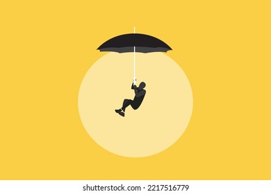 businessman hanging on umbrella. the concept of opportunity, success and hope