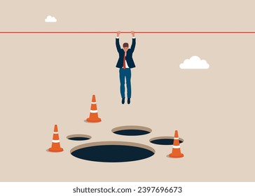 Businessman hangs on for dear life from a rope as he swings above a pits and obstacle. Avoid pitfall. Flat vector illustration