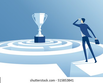 businessman has climbed to the top of the maze and trying to find the way to the cup, worker looks how to get through the maze and get a prize. business concept the way to victory