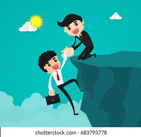 Businessman helping a friend climbing up on a rocky dangerous cliff at mountain by pulling him up with hand.friendship support, teamwork, partnership, faith, and trust concept.