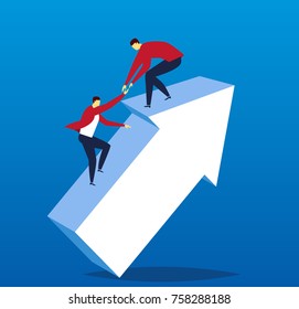 The businessman helps another businessman reach the top of the arrow