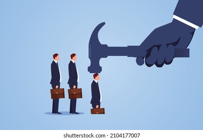 Businessman hits the hammer of the big hand into the ground