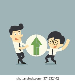 Businessman hold Jigsaw of arrows up