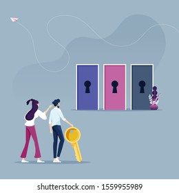 Businessman hold a key with different door-Business decision concept
