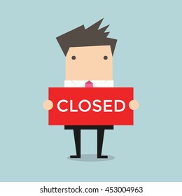 Businessman hold a sign Closed in his hands. Vector