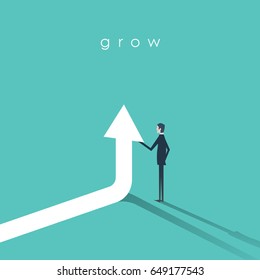 Businessman holding arrow going up vector symbol. Business concept of growth, success and achievement. Eps10 vector illustration.