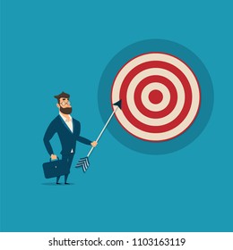 Businessman holding arrow and walking towards target. Concept business vector illustration