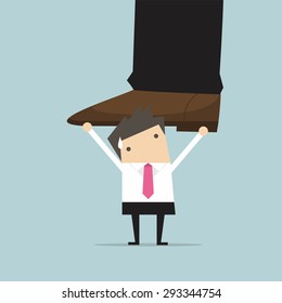 Businessman holding big businessman foot