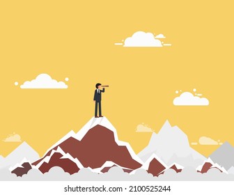Businessman holding binoculars on top mountain. success and search opportunities. growth, goal, leadership