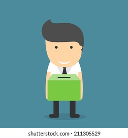 Businessman holding box