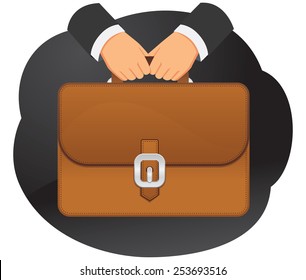 Businessman is holding a briefcase in hands