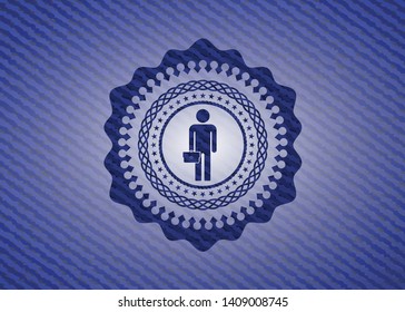 businessman holding briefcase icon inside badge with denim background