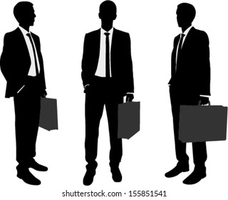 businessman holding briefcase silhouettes