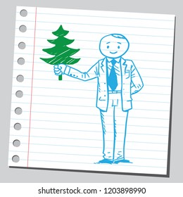 Businessman holding Christmas tree