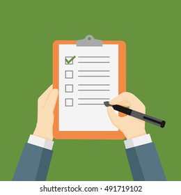 Businessman Holding A Clipboard and Filling A Checklist Form
