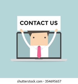 Businessman holding Contact us sign in computer notebook