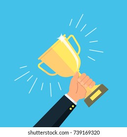Businessman holding a cup of the winner. Concept victory. Vector illustration in flat style.