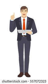 Businessman holding digital tablet PC and pointing up. Full length portrait of businessman in a flat style. Vector illustration.