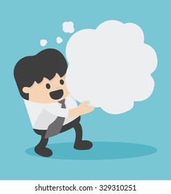 Businessman holding a empty speech bubble
