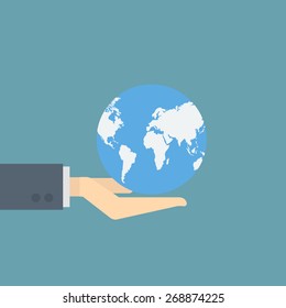 businessman holding globe