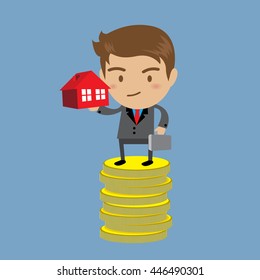 Businessman holding house on money, business concept