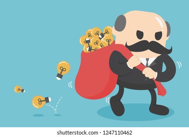 businessman holding a large light bulb