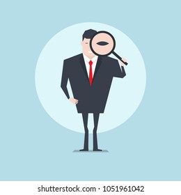 The businessman holding a magnifying glass and looking through a magnifying glass.