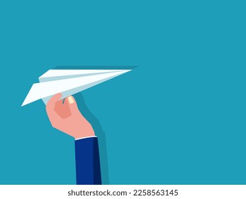 Businessman holding a paper plane. Commitment to the goal. business concept 