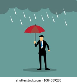 Businessman holding red umbrella standing under the rain