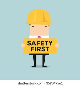 Businessman Holding Safety First Sign Vector