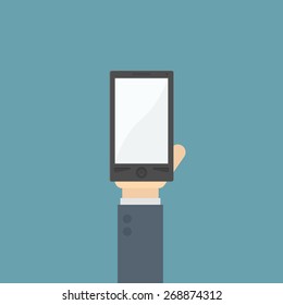businessman holding smartphone
