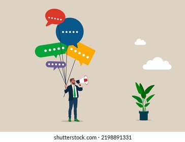 Businessman holding speech bubble balloons while talking on megaphone. Communication and media, Public Relations to communicate company information, announce sales or promotion.