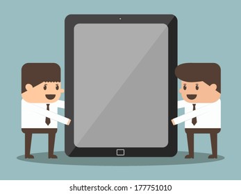 businessman holding tablet