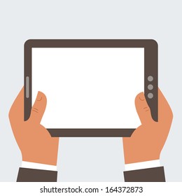 Businessman holding tablet computer with blank screen - free space for your text 