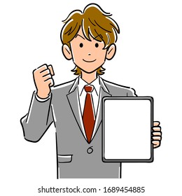Businessman holding a tablet PC with a blank screen and posing guts