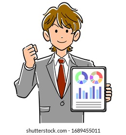 Businessman holding a tablet PC and posing guts
