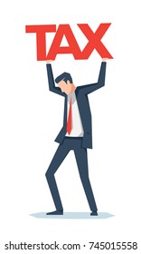 A businessman holding tax text