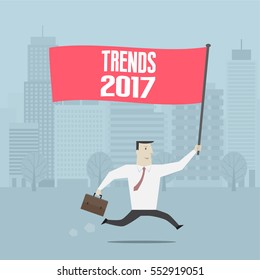 Businessman holding trends 2017 sign - Vector