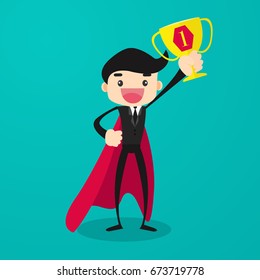 Businessman holding a trophy